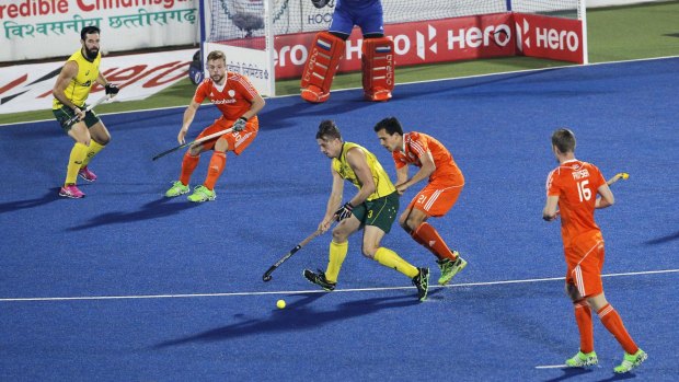 Australia's Simon Orchard controls the ball during the semi-final against the Netherlands.