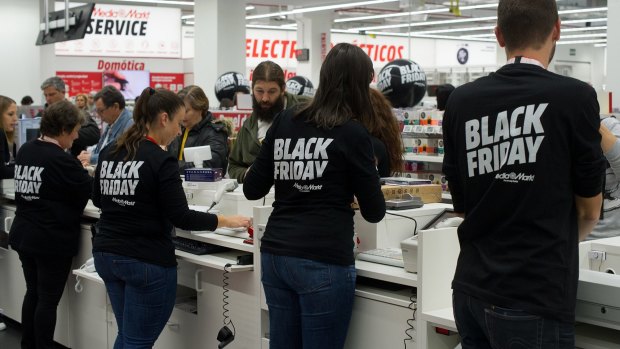 Workers of the consumer electronics company Media Market in Madrid in 2015.