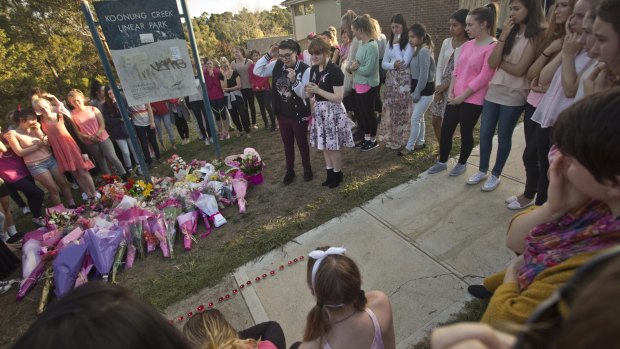 Local residents congregate near where Masa Vukotic was killed.