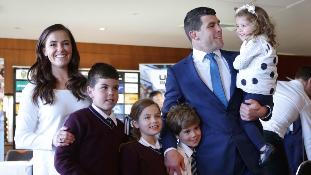 Michael Ennis with his wife Simone and their four children.