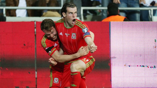 Gareth Bale (right) helped Wales to victory.