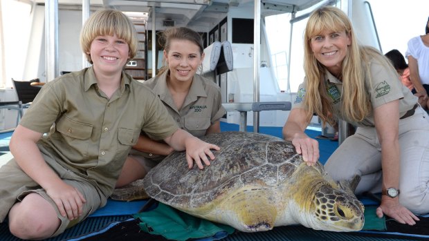 Australia Zoo's Robert, Bindi, and Terri Irwin with Dot, the three-flippered turtle.