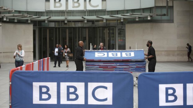 Erecting barriers near the main entrance of the BBC headquarters and studios in Portland Place, London, on Thursday. 