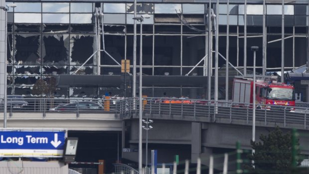 The blown out facade of the airport terminal.