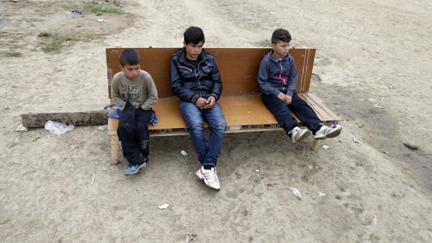 Children in a makeshift refugee camp at the northern Greek border point of Idomeni on Sunday. 