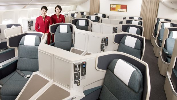 The business class cabin on the Cathay Pacific Boeing 777-300ER.