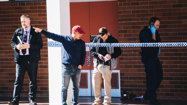 Scenes at the ANU after a man was arrested after allegedly attacking several people with a baseball bat in the Copland building.