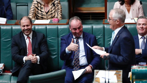 Minister for Environment and Energy Josh Frydenberg, Deputy Prime Minister Barnaby Joyce and Prime Minister Malcolm Turnbull during Question Time at Parliament House in Canberra on Wednesday. 