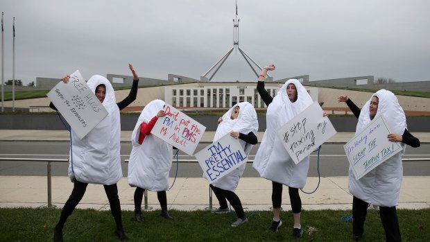 2015: Giant dancing tampons protest against the GST on sanitary products on the front lawn of Parliament House.