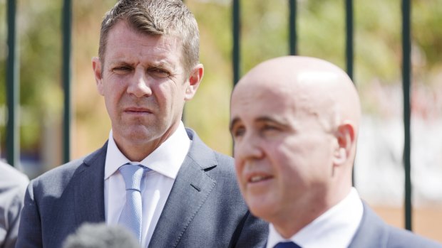 Education Minister Adrian Piccoli (pictured with Premier Mike Baird, left) will announce on Friday that the budget will double current funding for independent schools.