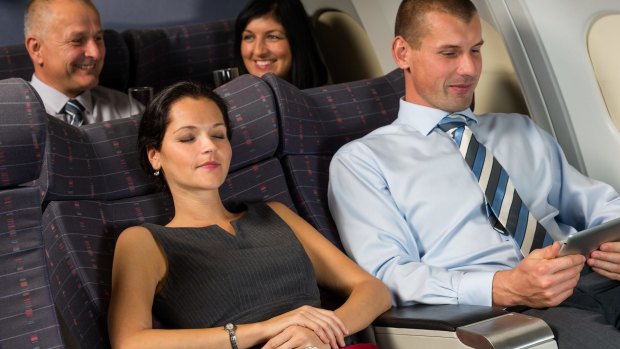 It's not hard to ask the person behind you before reclining your seat.