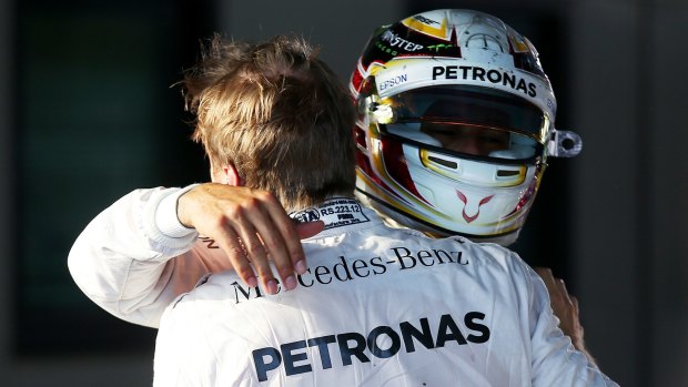 Nico Rosberg is congratulated by his teammate Lewis Hamilton after winning the Australian Formula One Grand Prix at Albert Park on March 20.