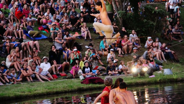 Perched performers moved from the boat to the slack line in front of a packed crowd.