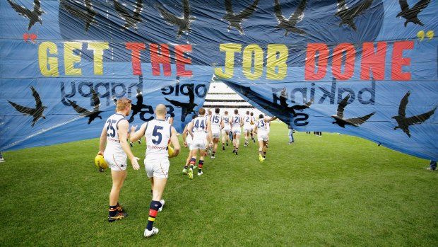 Adelaide pay tribute to coach Phil Walsh at the MCG.