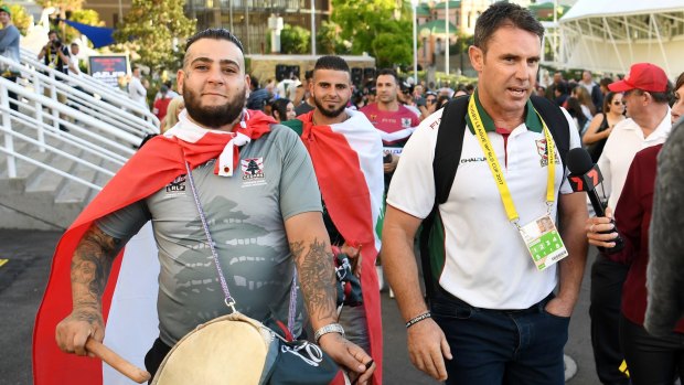 The beat of the tournament: Brad Fittler with Lebanese fans before taking on the Kangroos.