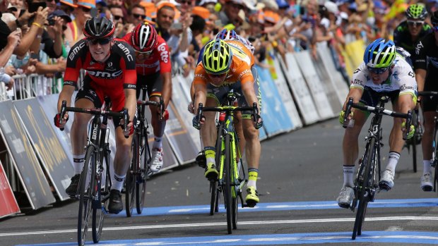  Simon Gerrans (right) edges out BMC's Rohan Dennis on the line to take the overall lead in the Tour Down Under.