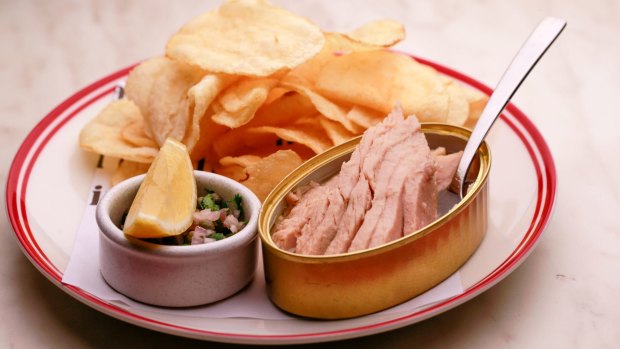 Tins of tuna belly with crisps.