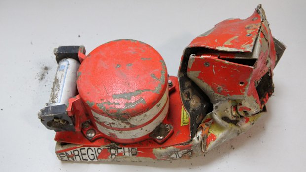 This photo shows the damaged voice data recorder of the Germanwings jetliner. The second black box, with the flight data recorder, has been found in the French Alps.