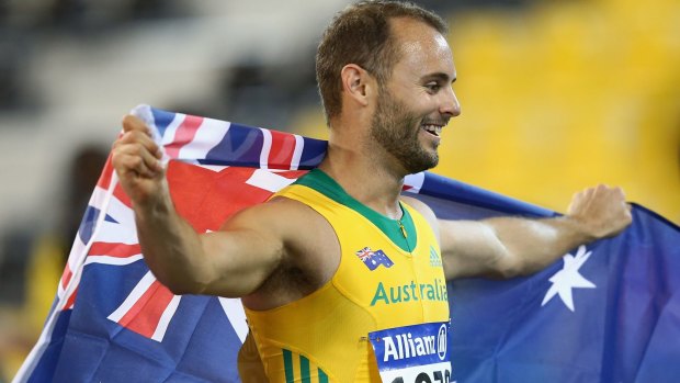 Canberra sprinter Scott Reardon celebrates winning the men's T42 100m at the IPC world championships in Doha.