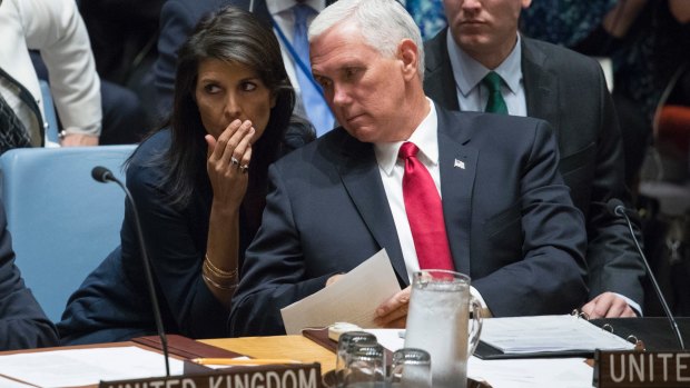 Nikki Haley whispers to US Vice President Mike Pence. Haley is widely viewed within the GOP as a future presidential candidate.