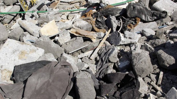 The rubble of a house which activists say belonged to al-Nusra Front after an air strike.