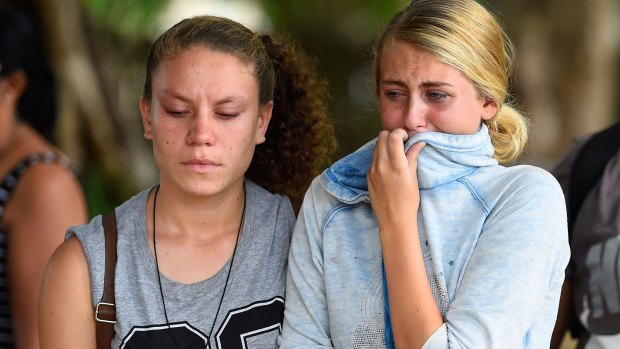 A community in pain after eight children were killed in a Cairns home.