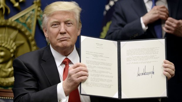 US President Donald Trump after signing the first executive order banning refugees and people from some Muslim-majority countries.