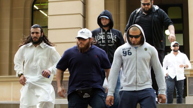 Mohamed Elomar (left) and Khaled Sharrouf (second from left) attend Ahmad Elomar's court appearance in 2012.