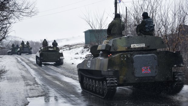 A pro-Russian armoured vehicle moves towards eastern Ukraine.