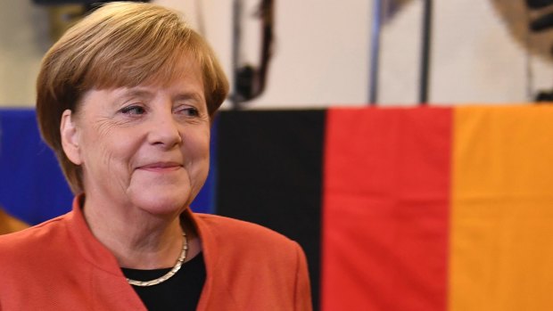 German Chancellor Angela Merkel's conservative bloc is on track to remain the largest group in parliament.