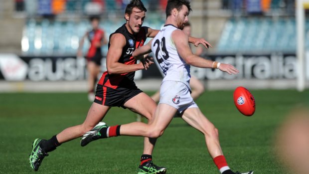 Ainslie's Cam Bernasconi (23) plays against Eastlake in 2014. He moved across to Eastlake HQ to play with the Canberra Demons this year.