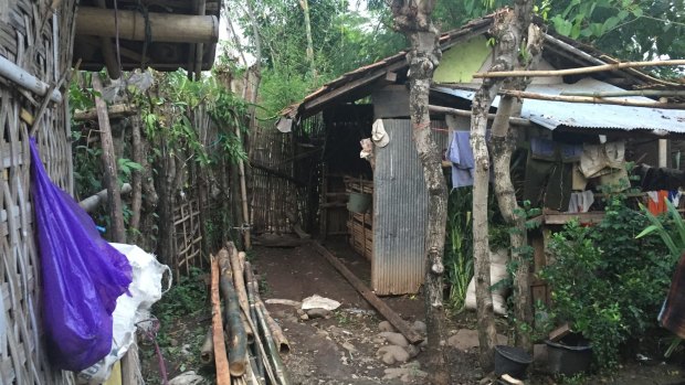 The bamboo gate leading to the area where Enja was killed. 