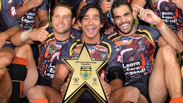 Indigenous pride: Johnathan Thurston, flanked by Greg Inglis and Tyrone Roberts.