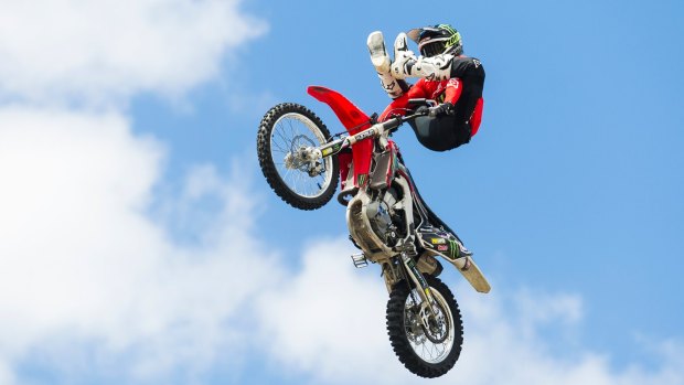 Canberra's Harry Bink flies five storeys in the air as he rehearses for Nitro Circus's 'The Next Level' show on Saturday.