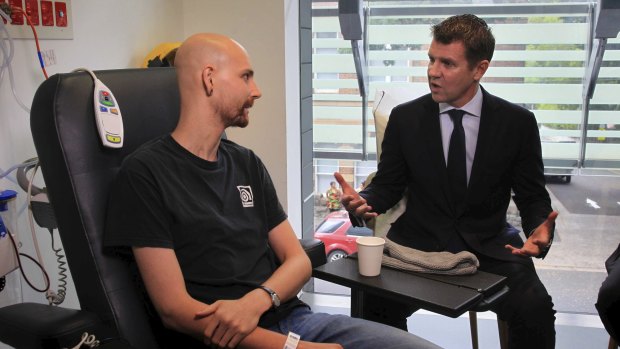Cancer sufferer Jack Richardson talks to NSW Premier Mike Baird at the Chris O'Brien Lifehouse after the announcement of the third medicinal cannabis clinical trial.