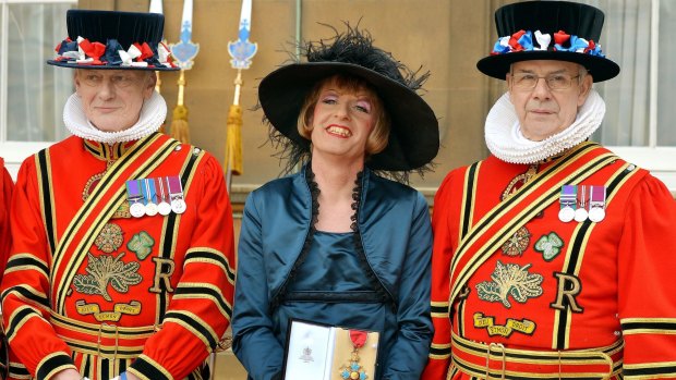 Grayson Perry reduced Prince Charles to a fit of giggles when he wore drag to receive his CBE at Buckingham Palace.