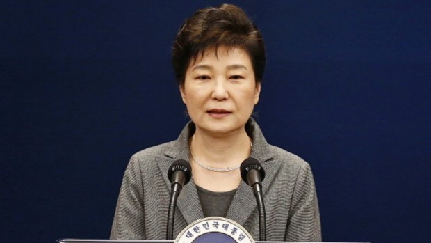 Park Geun-hye, pictured in November, is accused of colluding with long-time friend Choi Soon-sil to pressure big businesses to make contributions to non-profit foundations backing presidential initiatives.
