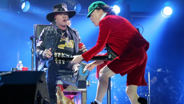 Singer Axl Rose, left, and lead guitar player Angus Young have kept AC/DC going this year.