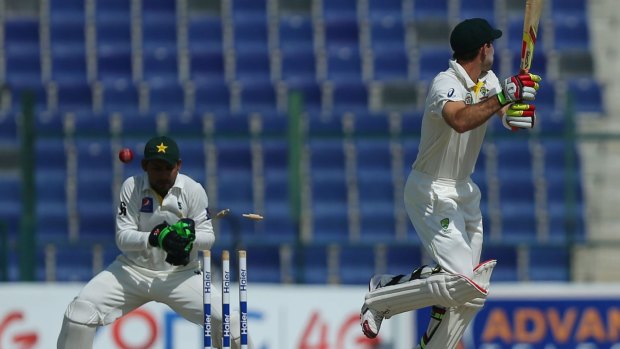 Glenn Maxwell is bowled by Zulfiqar Babar on the third day of the second Test between Pakistan and Australia in Abu Dhabi.