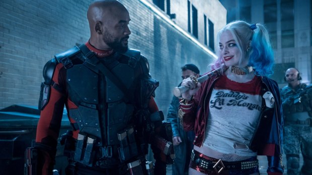Will Smith as Deadshot and Margot Robbie as Harley Quinn in <i>Suicide Squad</i>.