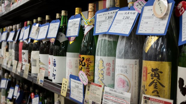 Bottles of sake at Akita Public Market, Akita, Japan. Sake is a Japanese rice wine made by fermenting rice that has been polished to remove the bran.