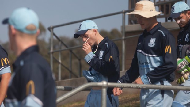 Big day: Steve Waugh's son Austin walks out to field in his Sydney first-grade debut for Sutherland.