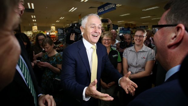 Prime Minister Malcolm Turnbull with a spring in his step on Tuesday morning at a Brisbane Mitre 10 store. Woz his dinner wot dun it. 