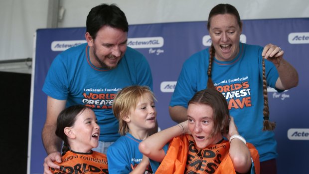 The Van Ballegooyens, clockwise from top left, Jason, Rowena, Matisse, 14, Abby, 8, and Eli, 6, all had their hair shaved at the Show on Saturday.