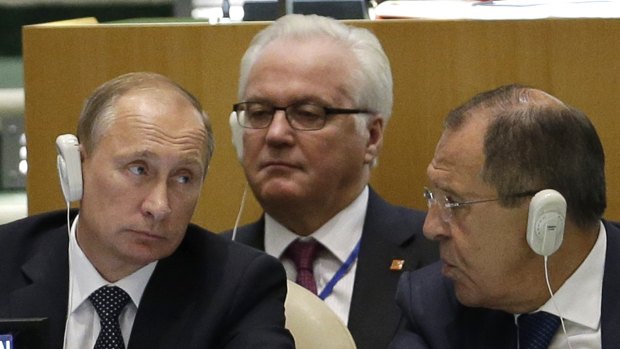 Russian President Vladimir Putin (left) with  Russia’s UN ambassador, Vitaly Churkin (centre), and Foreign Minister Sergey Lavrov at the UN. 