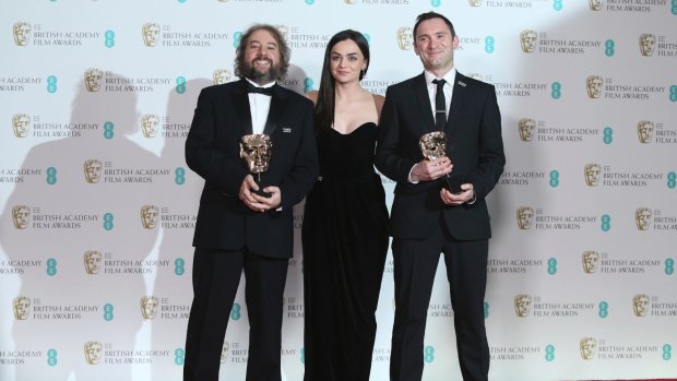 Australian editor Paul Machliss, left, and co-editor Jonathan Amos with actor Hayley Squires after winning the Best Editing award for Baby Driver at the BAFTAs this week.
