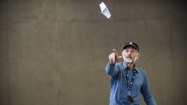 Dr Warren Smith's plane flew for seven seconds in the Red Bull Paper Plane air-time competition.
