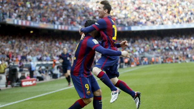 Barcelona's Lionel Messi (right) has scored 400 goals for Barcelona.