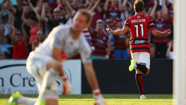 About time: Brendon Santalab celebrates after scoring Wanderers' second.