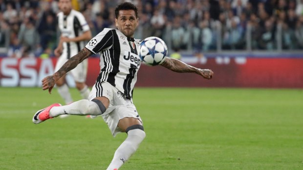 Juventus' Dani Alves scores his side's second goal.